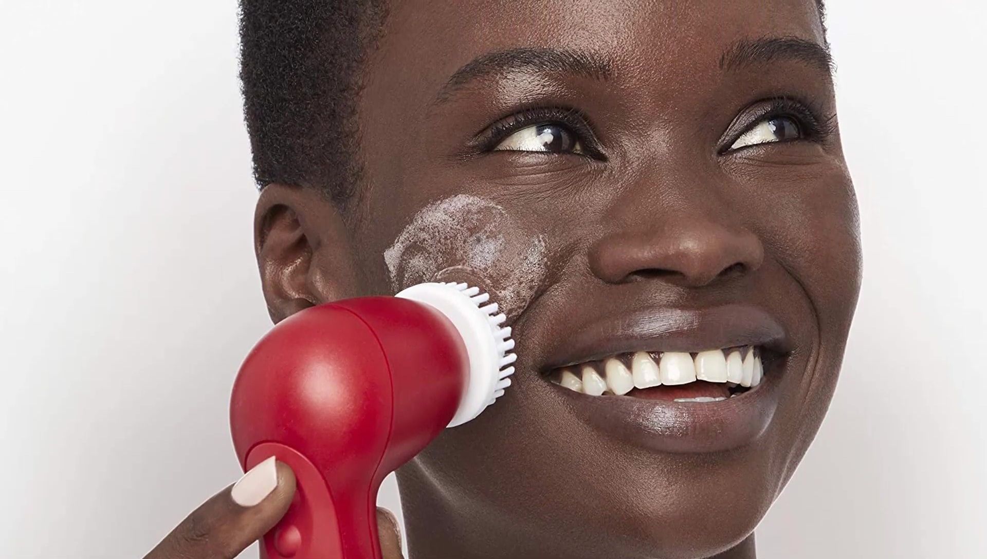 The Waterproof Facial Cleansing Spin Brush Set with multiple heads