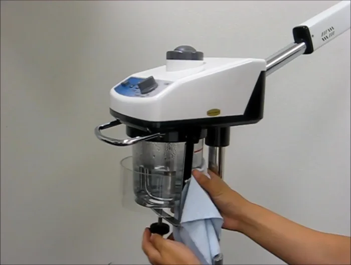 Empty, clean, and dry the jar. Refill with clean distilled water, reattach to the steamer, and run for an additional 5 minutes to remove vinegar smells.