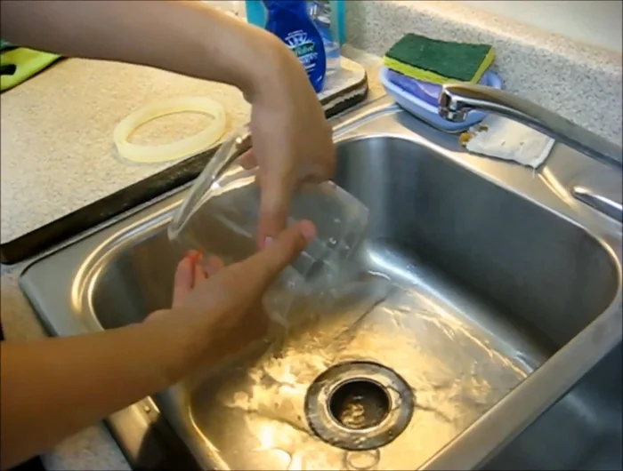 Clean the grommet with a little dish soap and tap water. Be gentle to avoid tearing the silicon.