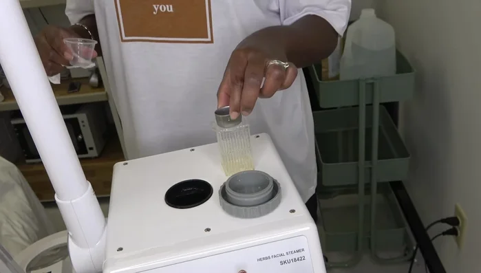 Show how to add herbs to the water reservoir for added benefits (cleansing and hydration).