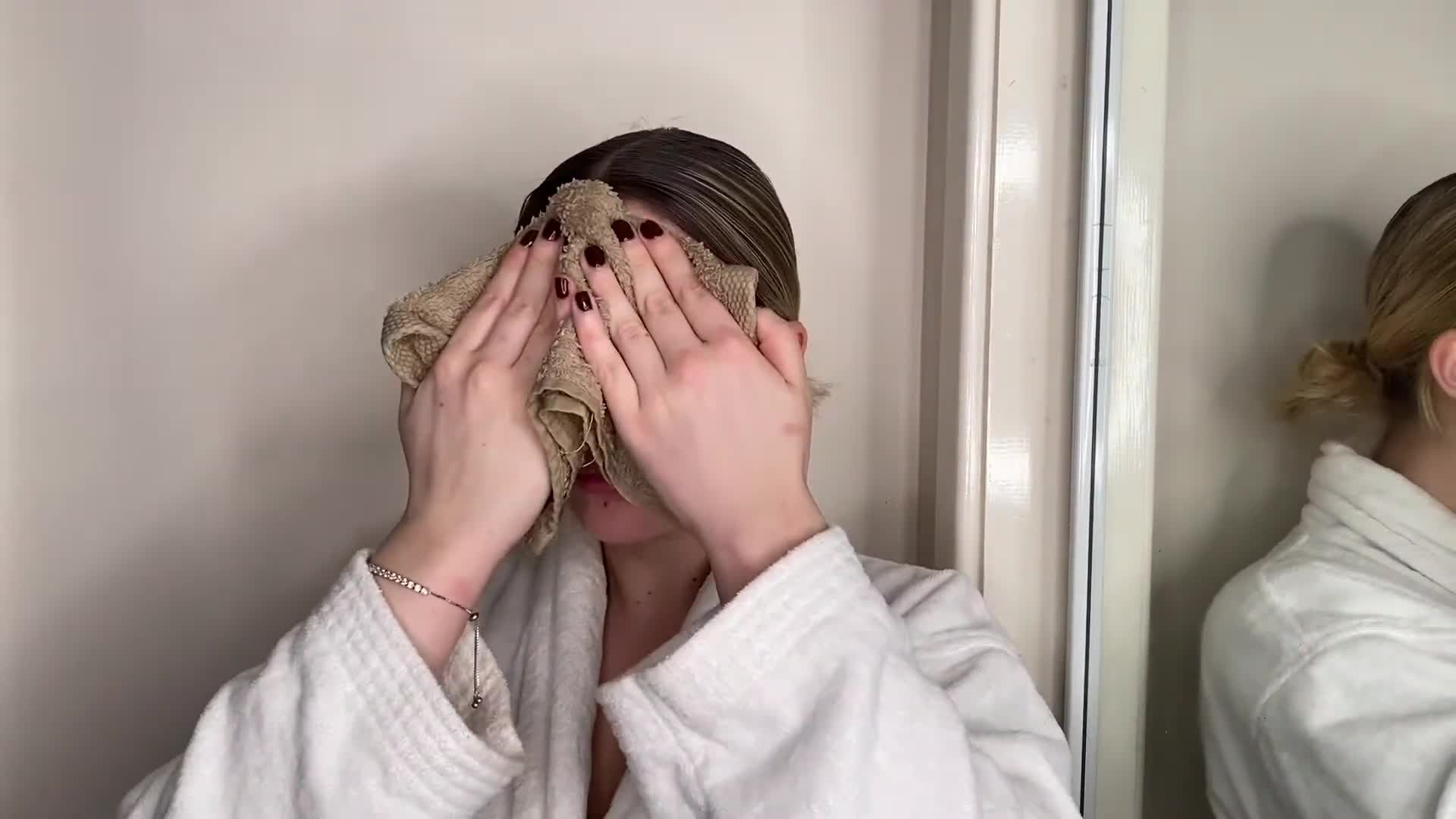 Wetting face with warm flannel