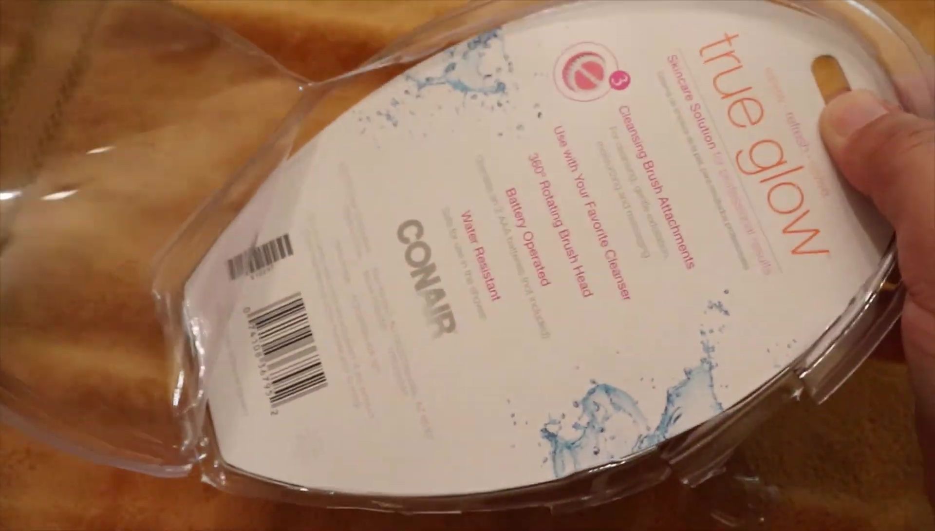 The Conair True Glow Facial Brush in its packaging.