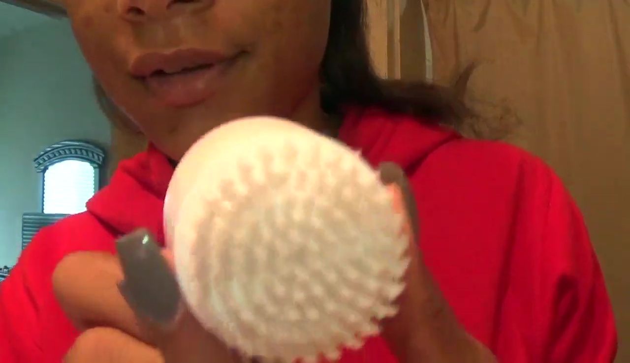 The vlogger's face after using the cleansing system.