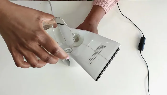 Empty and rinse: Empty the dirty water from the steamer.