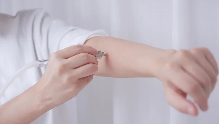 Perform the treatment for approximately 10 minutes. Turn off the machine, detach the diamond tape, and discard the cotton filter.