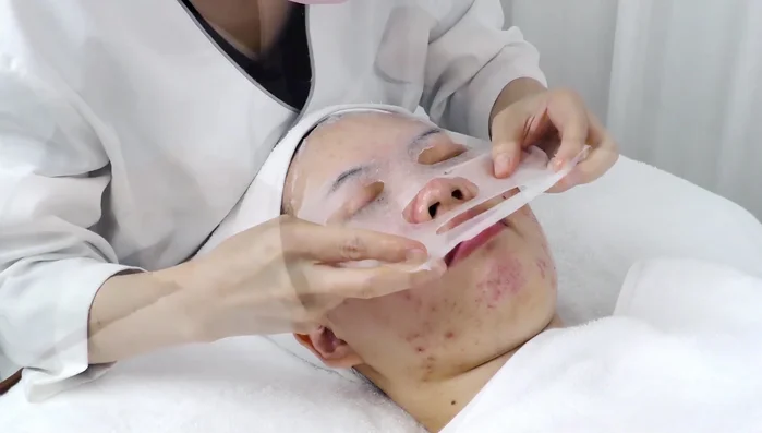 Apply sheet mask and LED light therapy for 15 minutes