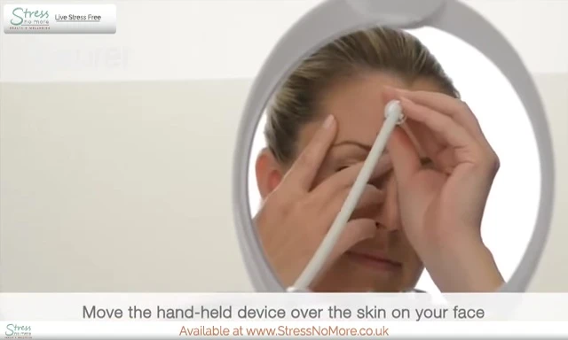 Applying the device to the face at a low intensity level.