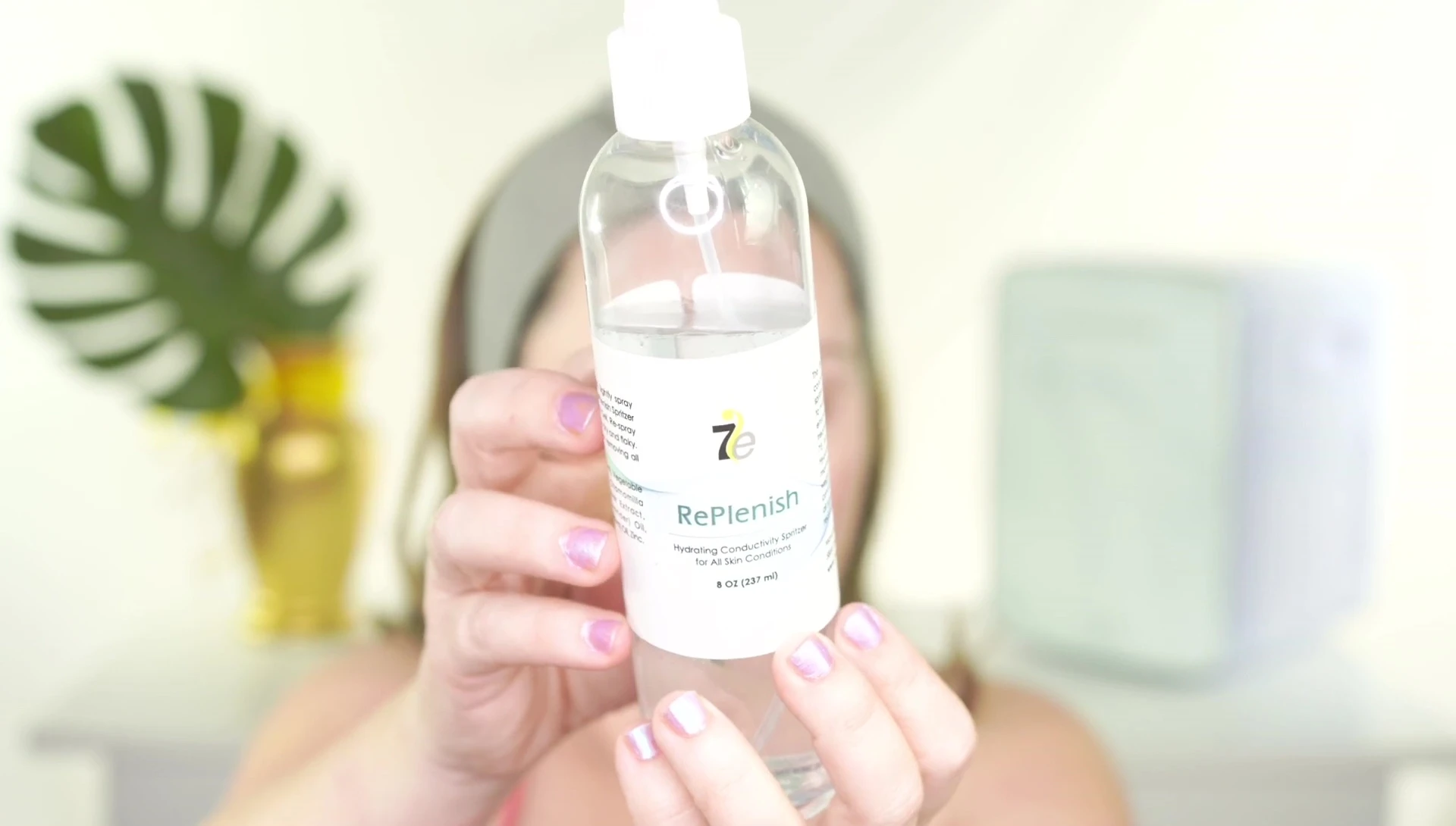 Close-up of a microcurrent spray bottle