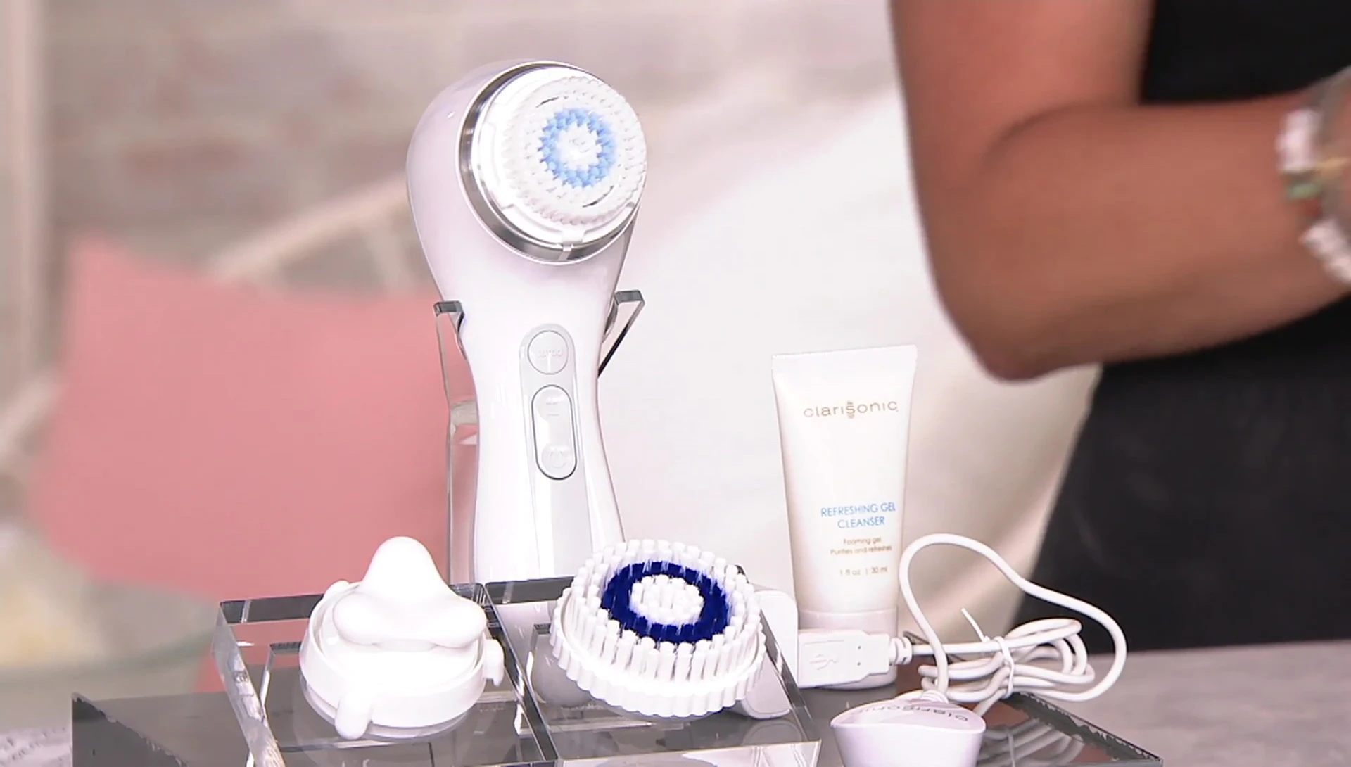 Close-up of the device with various brush heads