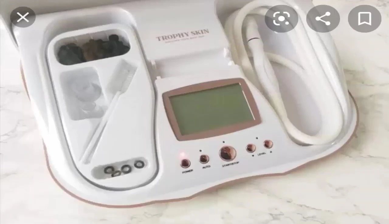 Ultraderm MD displayed in a handheld position, showing portability