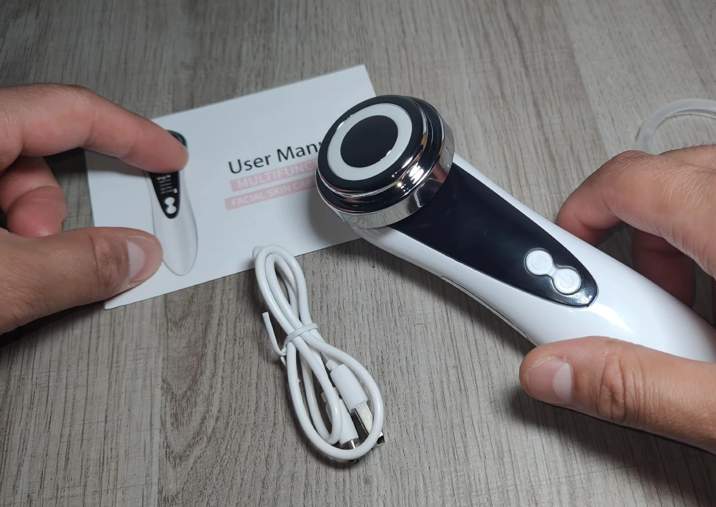Unboxing the massager and its accessories