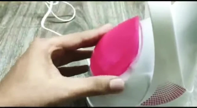 Close-up showing steam output and effect on skin