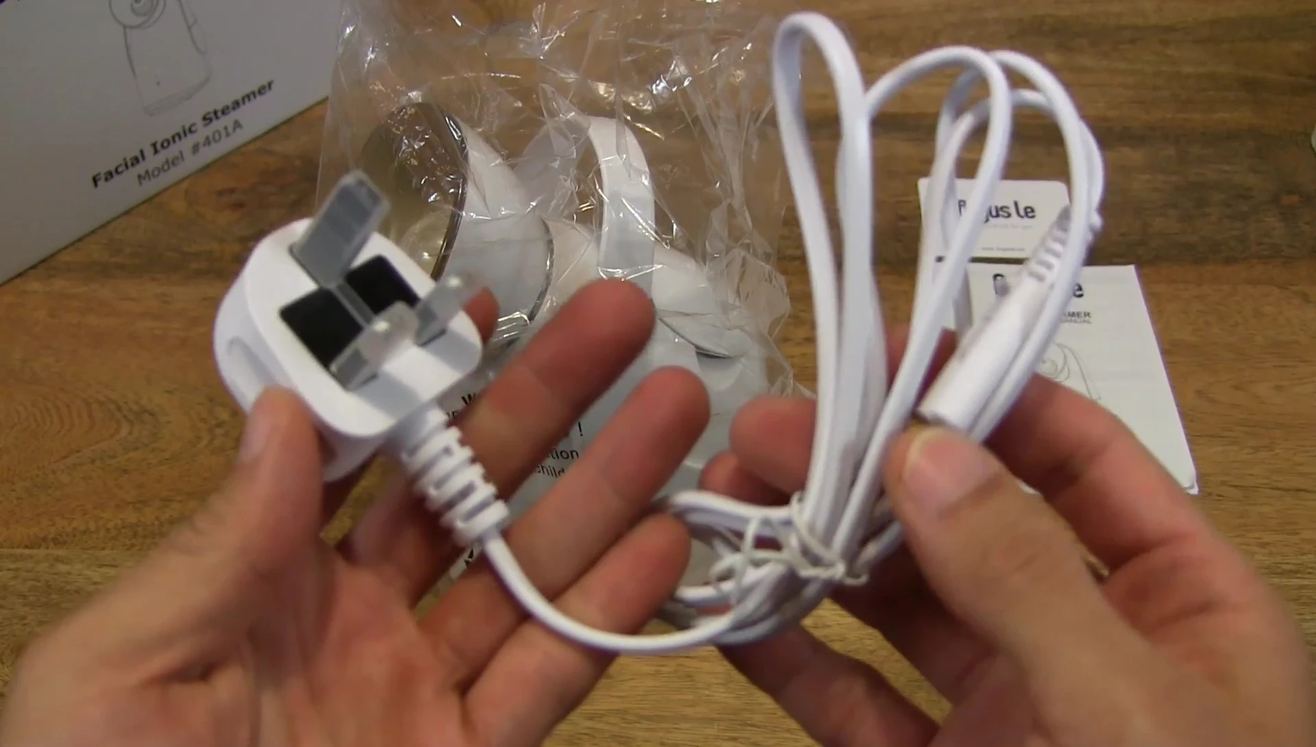 The power cable and protective plastic cap