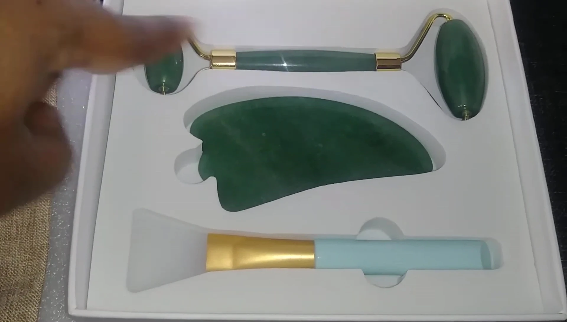 The gua sha tool shown in detail