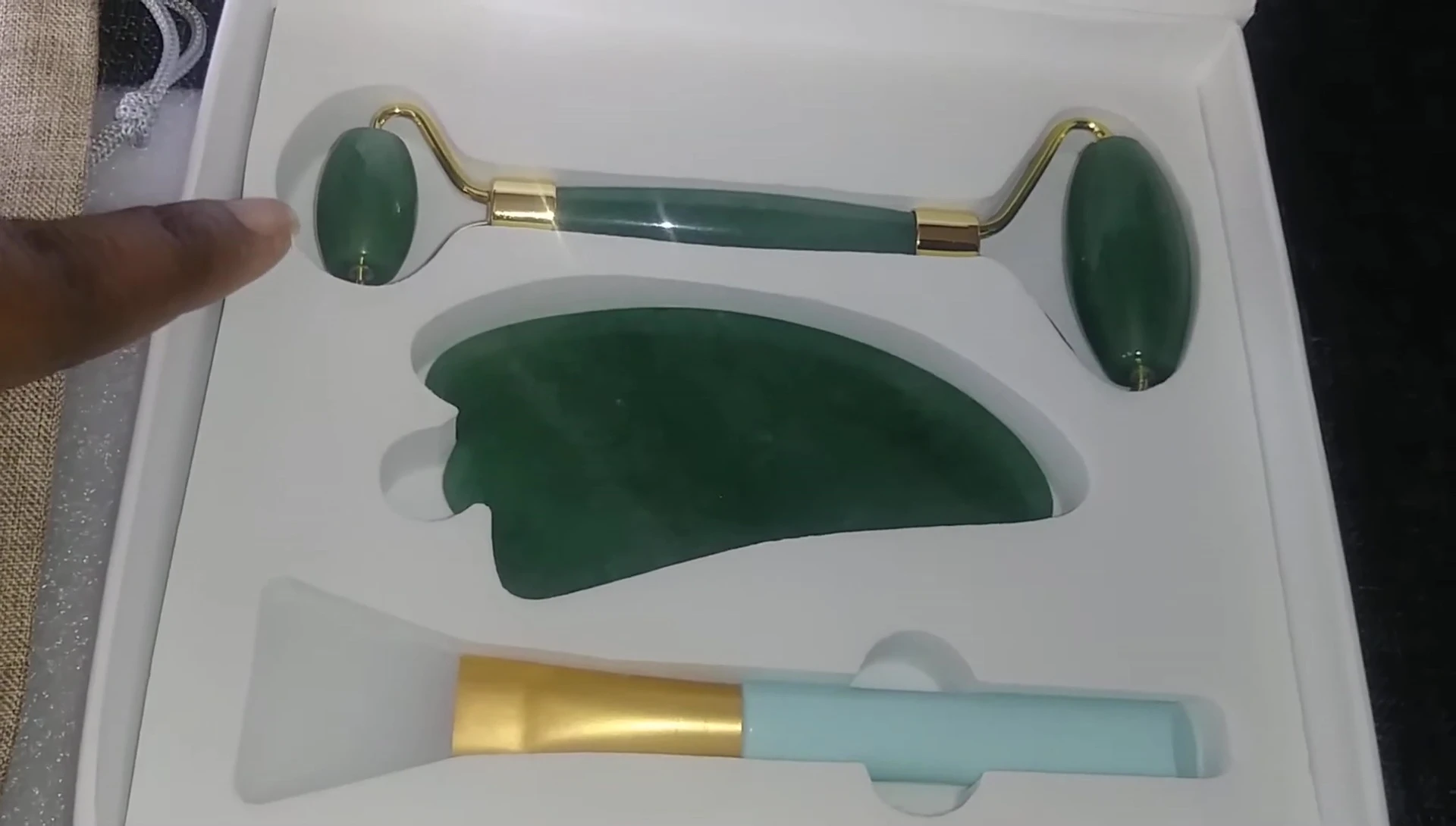 Close-up shot of the jade roller