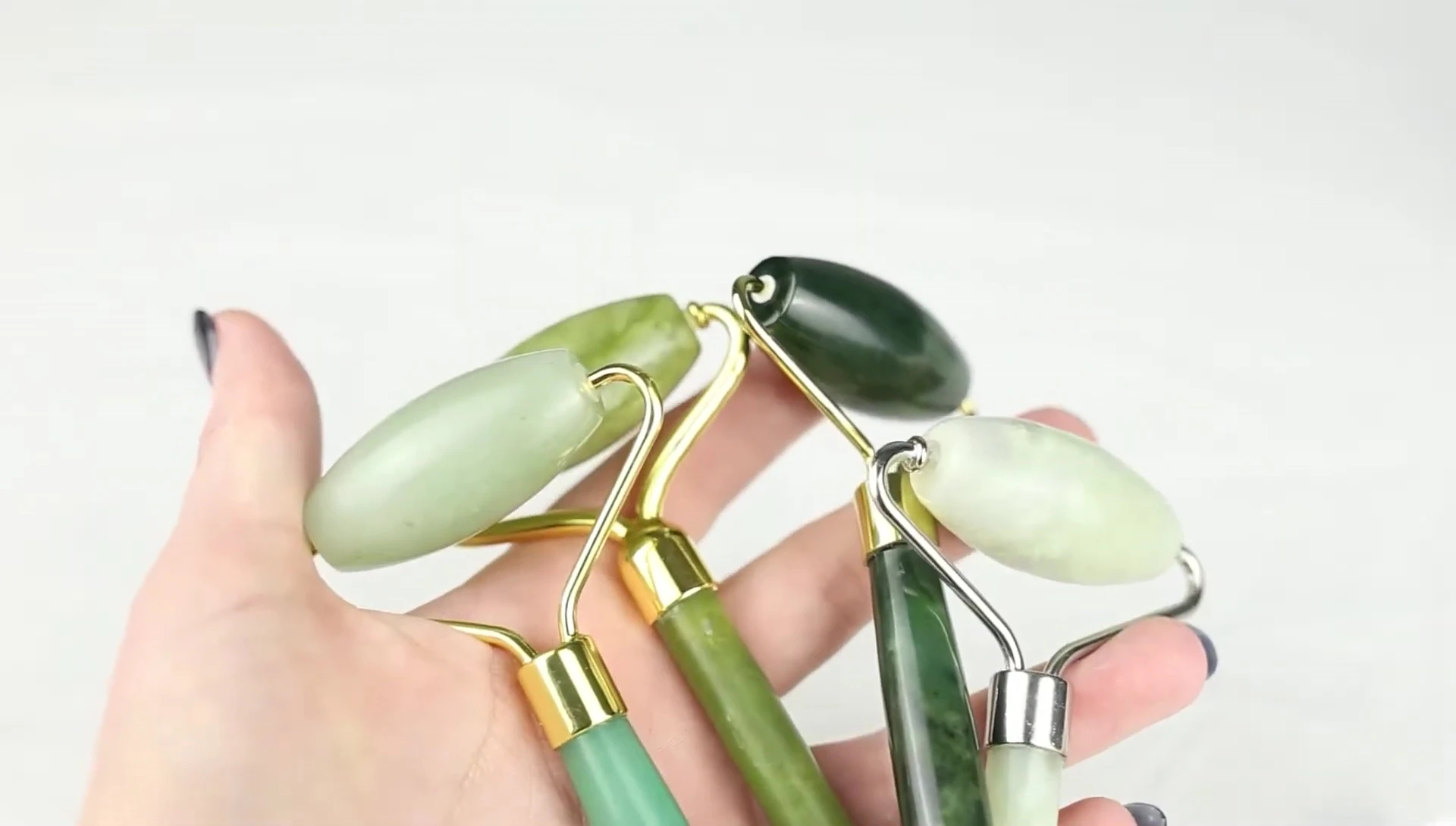 Image displaying a range of jade rollers with varying price points