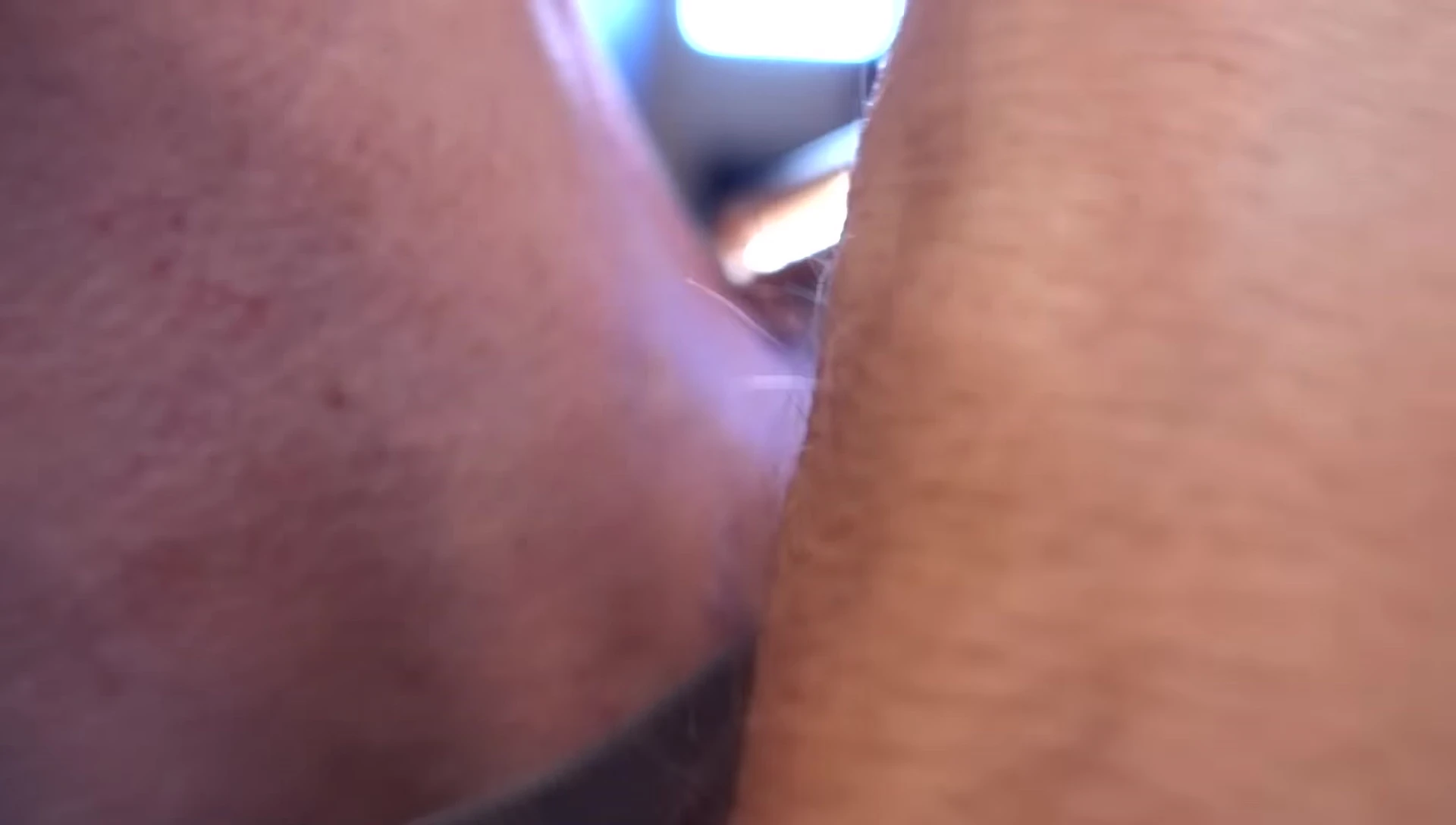 The reviewer testing the device on their beard, showing the difficulty in removing thicker hairs.