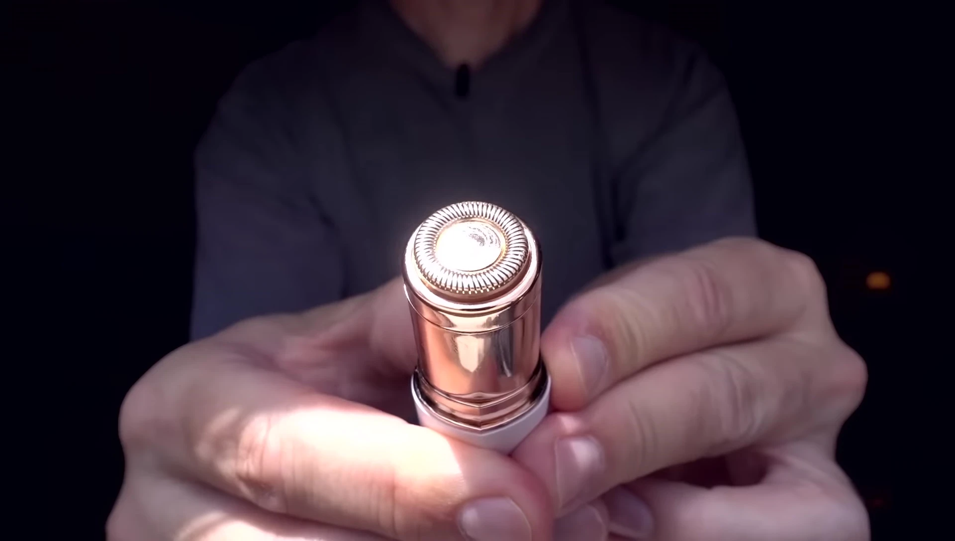 Final shot of the reviewer holding the clean device.