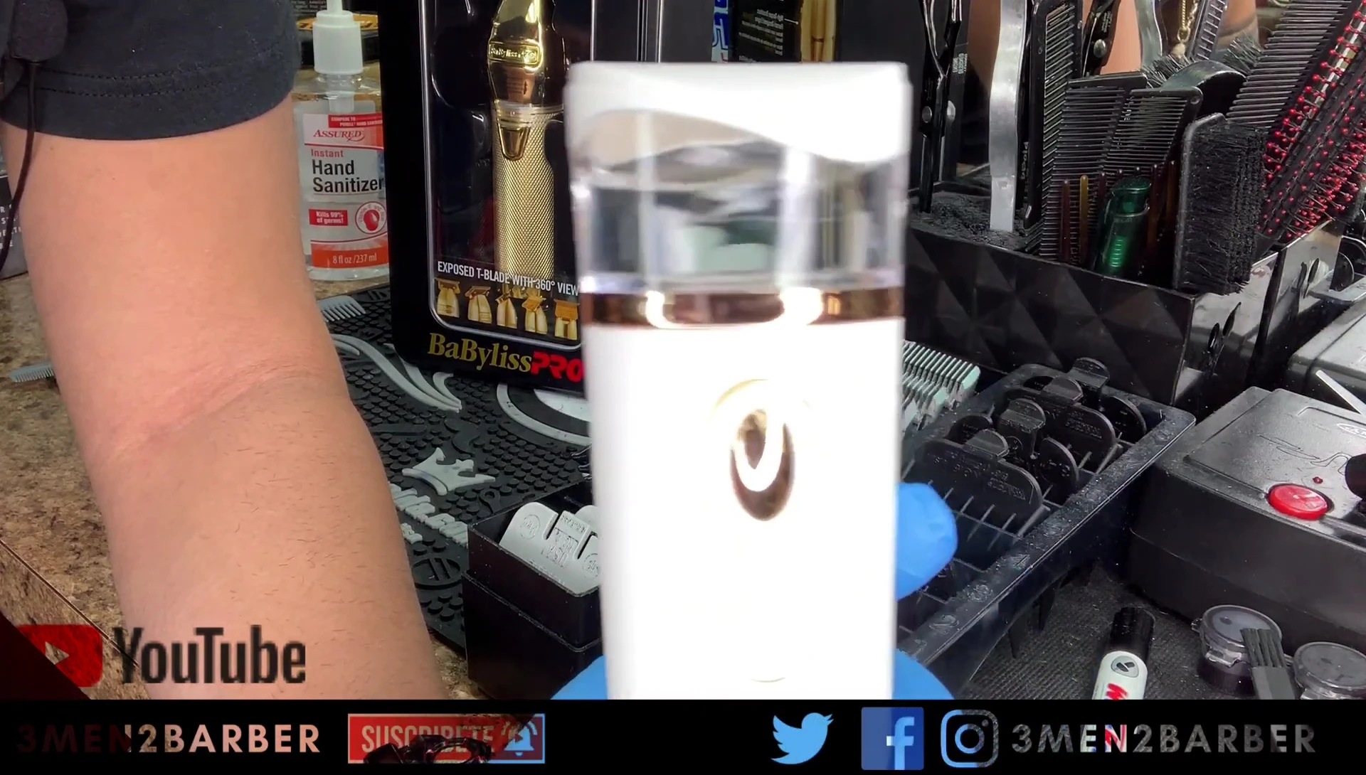 The sprayer being used to prep a client's face before shaving