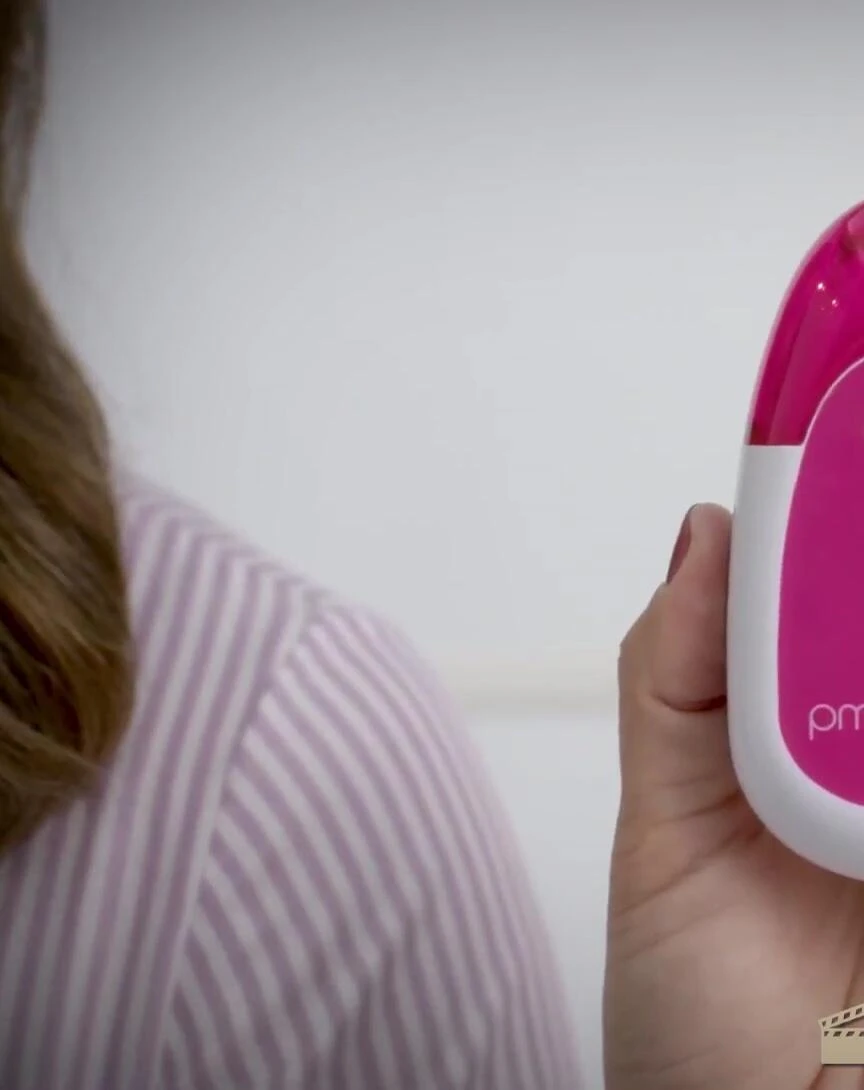 The PMD Kiss device shown prominently.