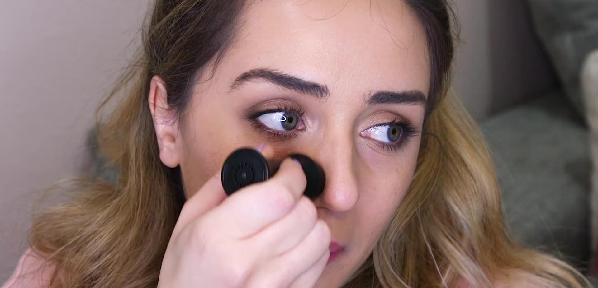 A comparison shot showing one side of the face after using the roller and the other side untouched.