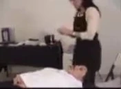 Therapist placing cotton in the client's ears.