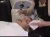Therapist examining the client's skin.