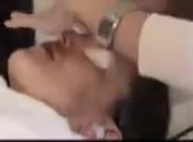 Therapist demonstrating treatment technique.