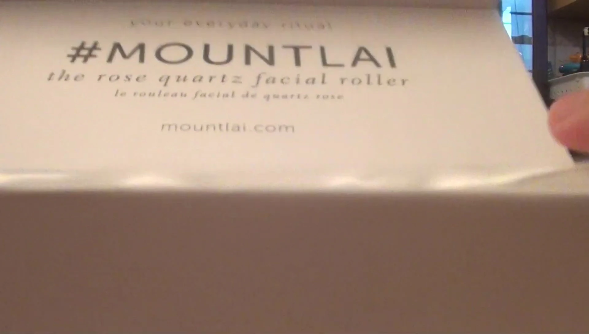 The Mount Lai facial roller in its elegant packaging