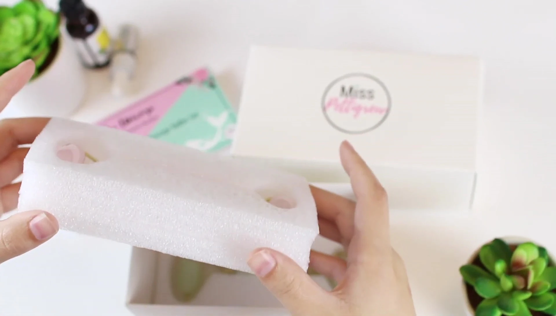 The rose quartz roller on a vanity.